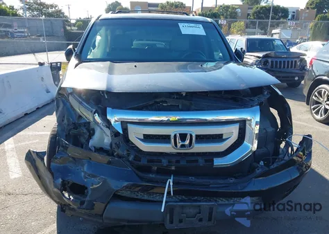 2011 Honda Pilot Lx z USA, uszkodzony, nr VIN 5FNYF3H29BB007767